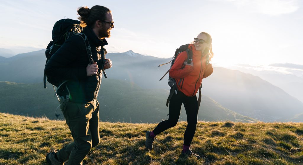 Two People walking on a trail