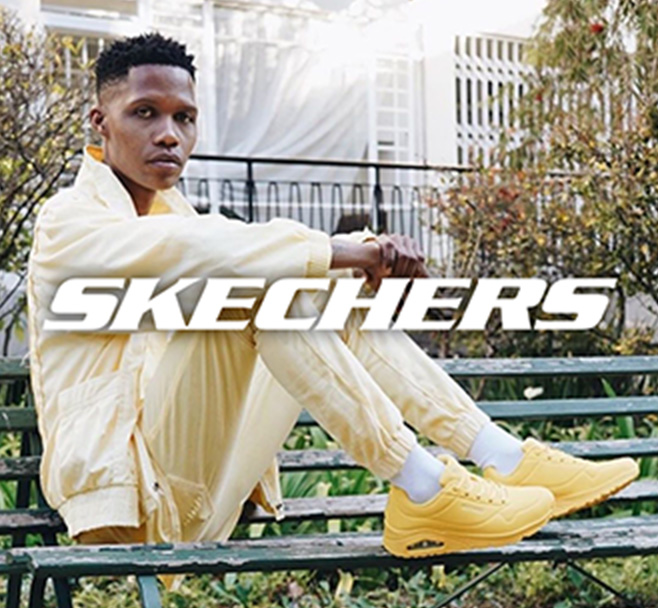 Skechers: Man wearing a yellow sweatsuit and yellow sneakers